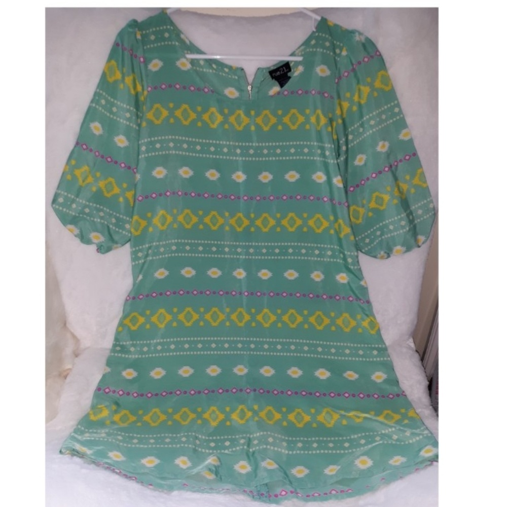 blue dress with yellow and pink details